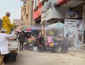 حملات تطهير بحى بولاق الدكرور لمواجهة انتشار كورونا