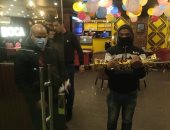 ضبط 9 كافيهات تقدم الشيشة بالدقى والحى يصادرها.. صور