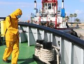 هيئة ميناء دمياط تواصل أعمال التعقيم والتطهير ضد كورونا.. صور