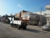 رش وتطهير الشوارع والمنشآت فى البحيرة لمواجهة كورونا .. صور