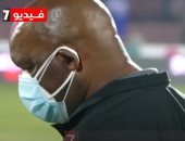 موسيمانى يقاوم كورونا بـ"كمامتين" في مباراة الأهلى ودجلة.. فيديو