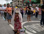 آلاف الفلبينيين يتضرعون "للناصري الأسود" من أجل إنهاء جائحة كورونا.. ألبوم صور