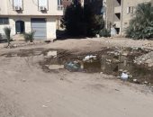 القابضة للمياه ترد على شكوى غرق مدخل عمارات مساكن التجاريين بأسوان بمياه الصرف