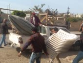 حملة لإزالة الإشغالات لإعادة الانضباط بحى الزهور ببورسعيد.. صور