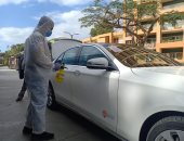 تعقيم وتطهير السيارات الخاصة بفندق منتخبات اليد باستاد القاهرة.. صور