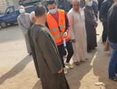  أهالى قرية مليج في المنوفية يوزعون كمامات بالمجان ويطلقون حملات توعية عن كورونا