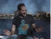 أحمد أمين فى صورة من تحت الأمطار: لما أنزل من غير جاكت علشان الدنيا حر