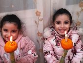 أقباط الأقصر يحتفلون بعيد الغطاس المجيد داخل منازلهم بقلقاس وقصب.. صور