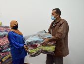 توزيع 1200 بطانية على عمال الجامعة ومشروع النظافة ببنى سويف