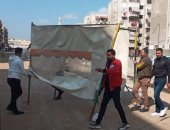 إزالة إشغالات الباعة الجائلين بشارع عبد الرحمن شكرى ببورسعيد لاستكمال أعمال الرصف