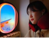 حيلة كورية لتجربة السفر رغم حظر كورونا.. مصباح على شكل نافذة الطائرة.. صور