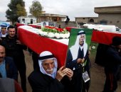 دفن رفات مئات الإيزيديين قتلى مجزرة "كوجو" على يد داعش الإرهابى.. صور