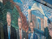دستور أمريكا وجرافيتى الرؤساء وصور بايدن وكامالا هاريس تزين مطاعم وشوارع واشنطن..ألبوم صور