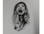الرسامة الصغير.. جوليا موهوبة فى الرسم بالفحم.. صور 