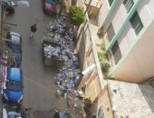 قارئ يشكو تراكم القمامة فى شارع شيديا كامب شيزار بالإسكندرية .. والشركة تستجيب