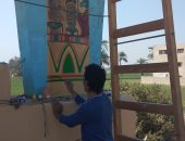 فنان يحول القرى إلى متاحف مفتوحة عن طريق الرسم فى قنا (فيديو لايف)
