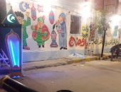 شارع بميناء البصل بالإسكندرية يتزين بشخصيات رمضانية مميزة.. صور 