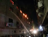 المعاينة الأولية لحريق كنسية العمرانية: ماس كهربى السبب والنيران التهمت 4 طوابق