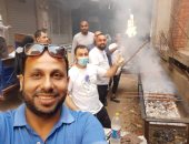 شباب مسلمون وإقباط يفطرون الصائمين فى الوارق بالجيزة.. صور 