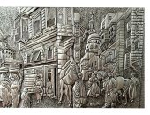 عمر يعبر عن موهبته الفنية بالرسم والنحت على النحاس