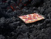 مطبوخ على 1000 درجة مئوية.. بيتزا "باكايا" البركانية في جواتيمالا.. ألبوم صور