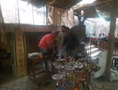 مصادرة 132 شيشة و302 كرسى وتحرير 22 محضر عدم ارتداء الكمامة بالجيزة