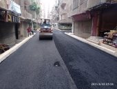 رصف وتطوير شارعى الخليفة والكوثر بأحياء الطالبية والهرم بالجيزة