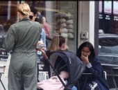 آمبر هيرد تتجول بصحبة ابنتها الرضيعة بشوارع لندن .. صور 