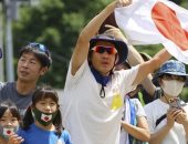 طوكيو 2020 .. طرق المشجعون المبتكرة لمشاهدة الأولمبياد رغم الحظر .. ألبوم صور