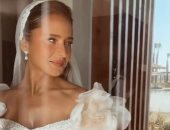 نيللى كريم تتفاعل مع أغنية la vie en rose بفستان الزفاف.. فيديو وصور