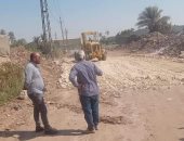 رصف الطريق أسفل الطريق الدائرى بصفط اللبن بالجيزة