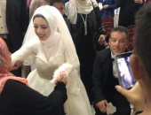 شاهد آخر لحظات العزوبية فى حياة عروسين من قصار القامة قبل دخول عش الزوجية