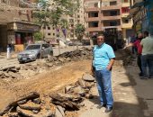 حى بولاق بالجيزة يرصف شارع ترعة عبد العال 2 ويرفع إشغالات المحال