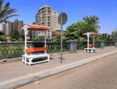 مقاعد ومظلات أمام معهد الأورام بكورنيش النيل لراحة المرضى.. صور