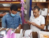 إعدام كميات حلوى مولد مجهولة المصدر فى شمال سيناء.. صور