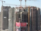 أبراج مثلث ماسبيرو تغير شكل منطقة الوكالة بعد اكتمالها وتشطيب واجهاتها.. 4 عمائر تطل على شارع 26 يوليو و900 وحدة للسكان الراغبين فى العودة.. وتسليم الشقق كاملة التشطيب مع مد شبكات المرافق للمنطقة.. صور