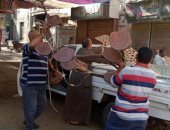 رفع إشغالات وإزالة إعلانات عشوائية غير مرخصة ونقل 65 طن مخلفات وقمامة ببنى سويف