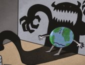 شبح التغيرات المناخية يرعب الكرة الأرضية فى كاريكاتير إماراتى