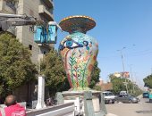 تنظيف تماثيل وجداريات مدخل مدينة قنا الغربى