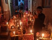 صور.. أطفال قرية كومير بإسنا يحتفلون بعيد الغطاس المجيد