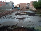 أهالى قرية الدفراوى يشكون من تراكم مياه الأمطار بالشوارع.. ومحافظة البحيرة تستجيب