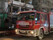 صور.. إخماد حريق بشدادت واجهة عقار علي شارع فيصل دون اصابات