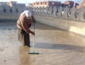 أوقاف القليوبية تشن حملة لرفع مياه الأمطار من أعلى المساجد
