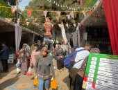 إقبال المواطنين على مهرجان التمور ومعرض زهور الربيع بحديقة الأورمان