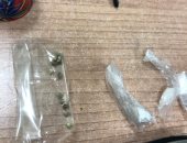 ضبط راكب بمطار القاهرة بحوزته كمية من الماريجوانا والكوكايين ومطحنة