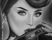 "هدير" تشارك موهبتها فى رسم البورتريهات وتحلم بالعالمية