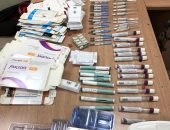 ضبط راكب عربى بمطار القاهرة حاول تهريب أدوية بقيمة نصف مليون جنيه.. صور