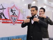 بحبك يا أبيض.. عريس أسيوط يصمم شقته بشعارات الزمالك ويحمل العلم فى شهر العسل