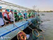 مشاركة 70 متطوعا فى حملة تنظيف نهر النيل بدسوق .. صور