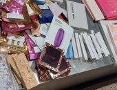 ضبط محاولة تهريب 749 عبوة مستحضرات تجميل بمطار القاهرة.. صور   